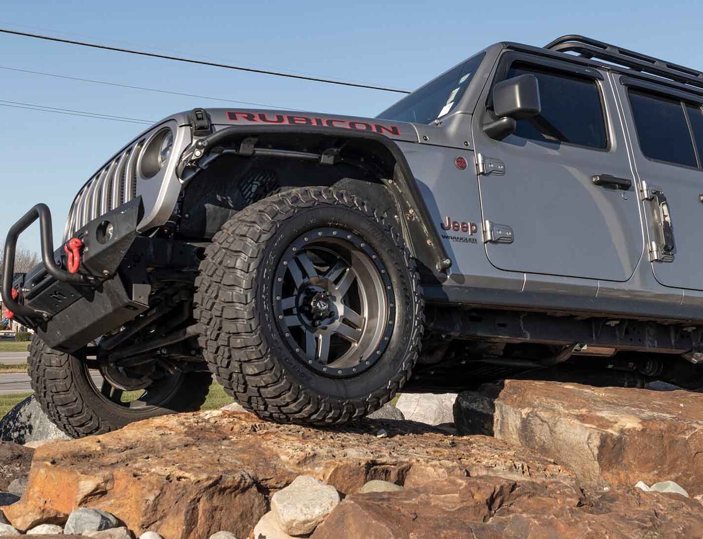 Jeep Certified Collision Repair - Jeep climbing rocks
