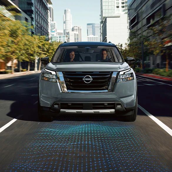 Nissan ADAS after Nissan Certified Collision Repair One Twenty-One Nissan Certified Collision Center - Blue SUV